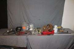 (4) Power Strips, Pittsburgh 2 Ton Jack, Jumper Cables, Electrical Cords, Fan, C-Clamp, Zip Ties, Tire Tool, and Misc.