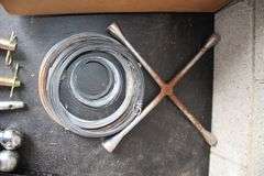 (2) 1 7/8 Inch Balls, Hitch Pins, 4-Way Lug Wrench, Wire, and Misc.