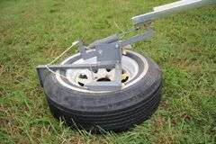 Champion High Fly Target Thrower Mounted on a CLM ST F78-14 Tire