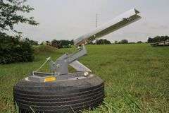 Champion High Fly Target Thrower Mounted on a CLM ST F78-14 Tire