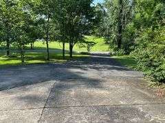 PARCEL 1: LOG HOME - BASEMENT - GARAGE - 1.2 ACRES: 487 Quiggins Lane, Leitchfield, KY 42754