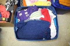 Purses, Various Size Shirts, Blouses, Sweaters, Pants, Turtlenecks, and Misc. Clothing