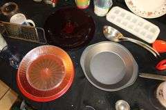 Magic Bullet Mixer, Magic Bullet Mixer Cups, Sheffield Decorative Plates, Coffee Mugs, Spatulas, Tongs, Plastic Cups, Ice Tray, and Misc.