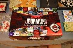 Dartboard with Darts and Frame, Dominos, Chess Board, Poker Tiles, ESPN Jeopardy, and Misc. Board Games