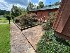 PARCEL 1: LOG HOME - BASEMENT - GARAGE - 1.2 ACRES: 487 Quiggins Lane, Leitchfield, KY 42754