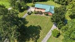 PARCEL 1: LOG HOME - BASEMENT - GARAGE - 1.2 ACRES: 487 Quiggins Lane, Leitchfield, KY 42754