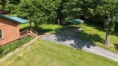 PARCEL 1: LOG HOME - BASEMENT - GARAGE - 1.2 ACRES: 487 Quiggins Lane, Leitchfield, KY 42754