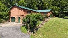 PARCEL 1: LOG HOME - BASEMENT - GARAGE - 1.2 ACRES: 487 Quiggins Lane, Leitchfield, KY 42754