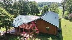PARCEL 1: LOG HOME - BASEMENT - GARAGE - 1.2 ACRES: 487 Quiggins Lane, Leitchfield, KY 42754