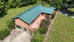 PARCEL 1: LOG HOME - BASEMENT - GARAGE - 1.2 ACRES: 487 Quiggins Lane, Leitchfield, KY 42754