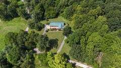 PARCEL 1: LOG HOME - BASEMENT - GARAGE - 1.2 ACRES: 487 Quiggins Lane, Leitchfield, KY 42754