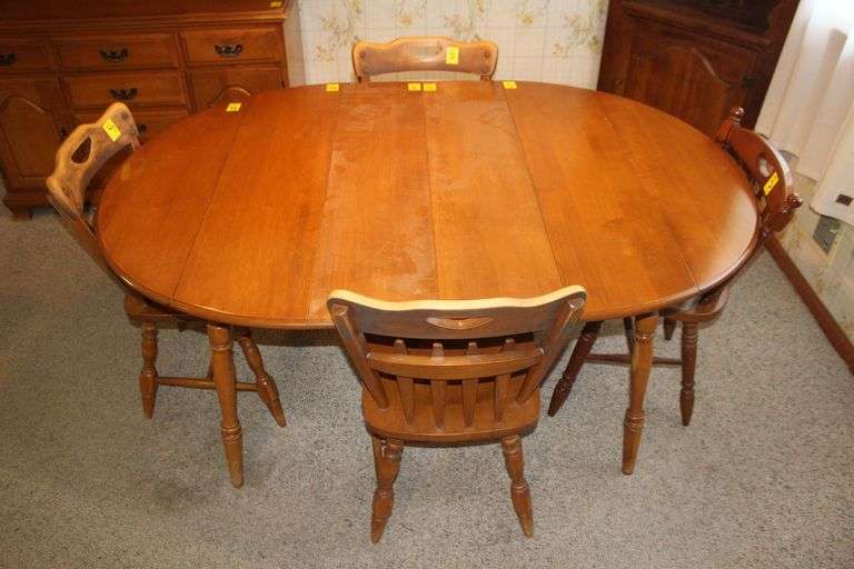 Dining Table with (4) Leaves and (4) Chairs