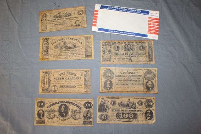 1861 Confederate States of America 1,000 Dollar Bill, 1862 State of Mississippi 100 Dollar Bill, 1862 Virginia Treasury Note 100 Dollar Bill, 1862 North Carolina 1 Dollar Bill, 1862 Arkansas Dollar Bill, 1862 The Cotton Planters Association 5 Dollar Bill, and 1864 Georgia 100 Dollar Bill