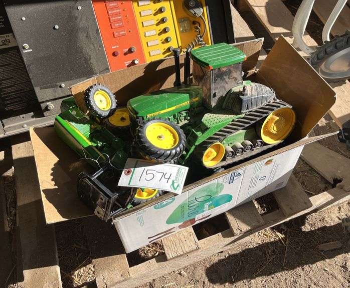 Box of used John Deere toys, bldg:Green