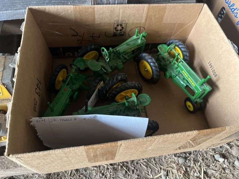 (4) John Deere toy tractors, bldg:locked