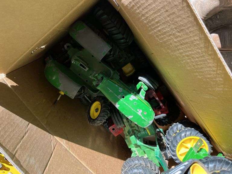 Box of used John Deere toys, bldg:Green