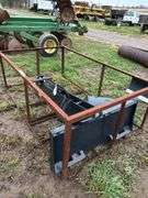 Skid steer quick attach back hoe with 20" bucket, owner states new, row:3