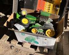 Box of used John Deere toys, bldg:Green