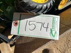 Box of used John Deere toys, bldg:Green