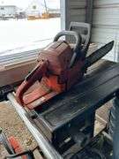 Husqvarna cut off saw, Husqvarna 455 chain saw, (1) Doug & Sam 10" table saw, bldg:Green