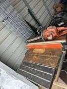 Husqvarna cut off saw, Husqvarna 455 chain saw, (1) Doug & Sam 10" table saw, bldg:Green