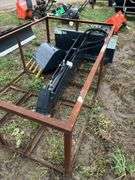 Skid steer quick attach back hoe with 20" bucket, owner states new, row:3