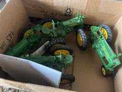 (4) John Deere toy tractors, bldg:locked