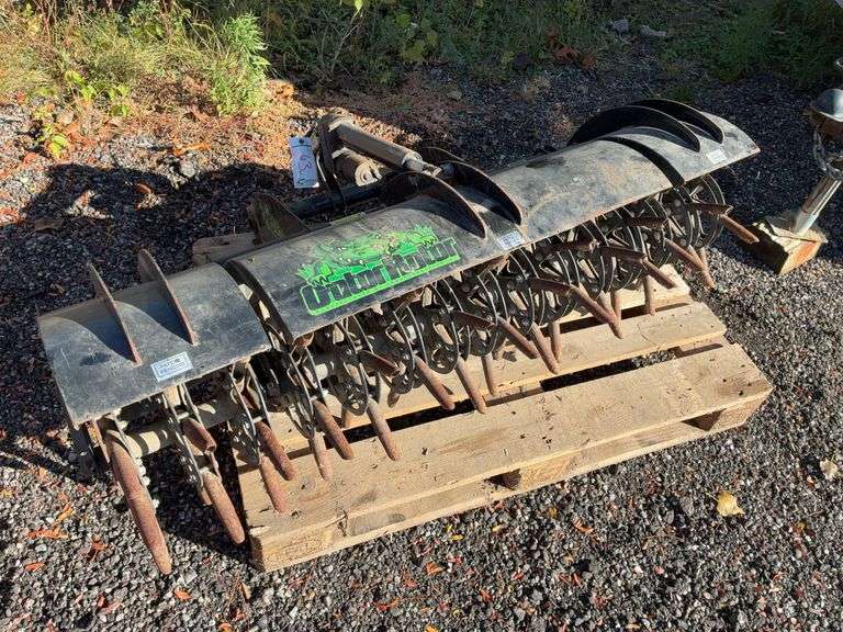 Gator rator aerator mounts to front of zero turn mower image