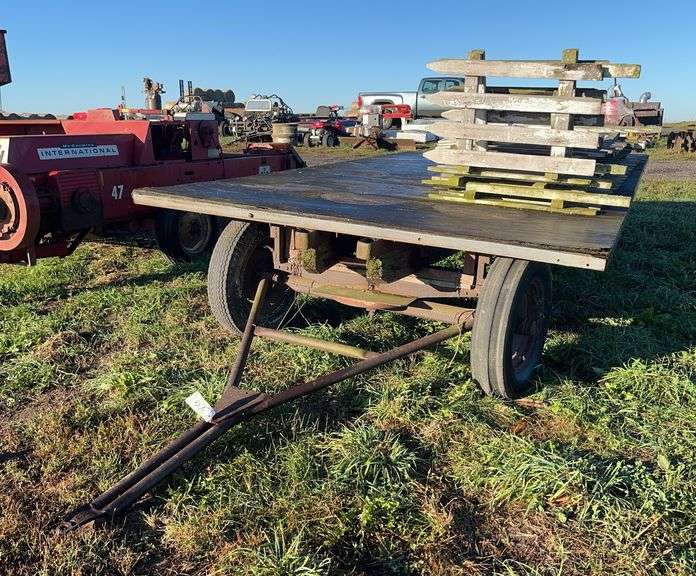 Flat rack hay wagon with white picket fence, row:3