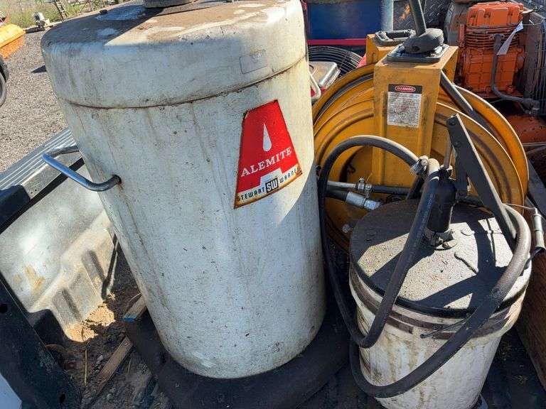 Oil and grease drums with pumps 2 rotary style fluid pumps 2 hose reels unknown condition image