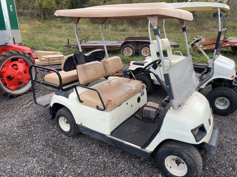 Yamaha electric golf cart with charger image
