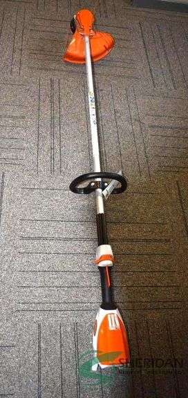 Stihl FSA 60R Battery Powered Trimmer w/ Charger and AK20 Battery w/ Eye Protection and Spool of Line image