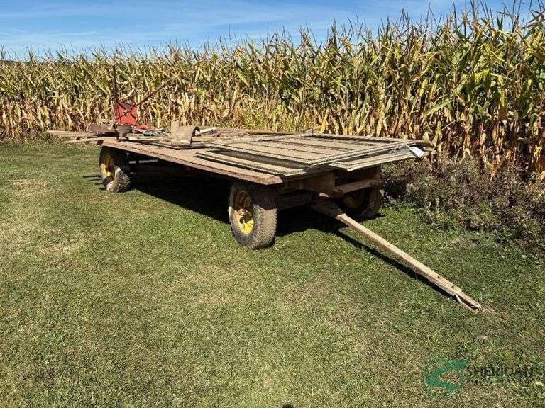Flatbed wagon on John Deere running gear, 7.5 ft x 14 ft image