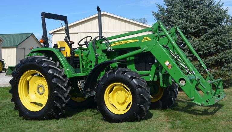 John Deere 6115 D with 673 Loader image