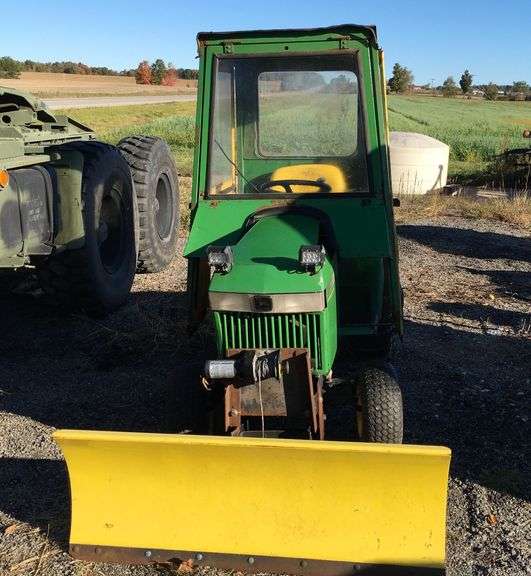 John Deere 300 Lawn Tractor w/ Cab & Snow Plow image