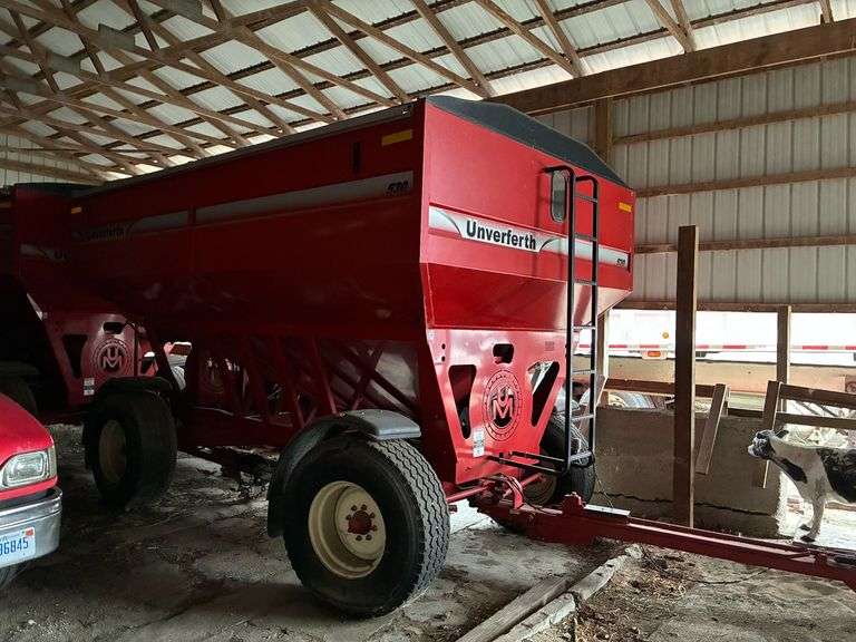 Unverferth 530 gravity wagon with brakes, lights, and roll tarp image