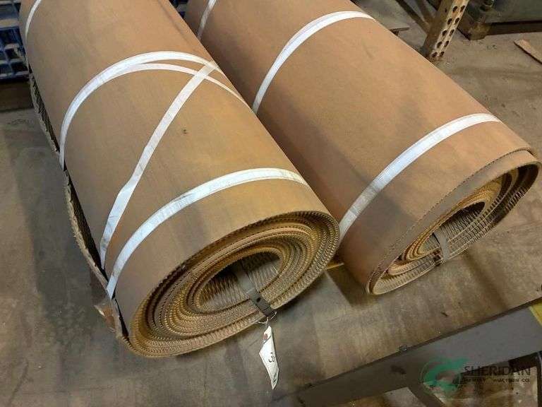 (2) Rolls of rubber conveyor belting image