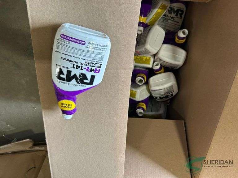 Numerous unused empty spray bottles we have some handles image