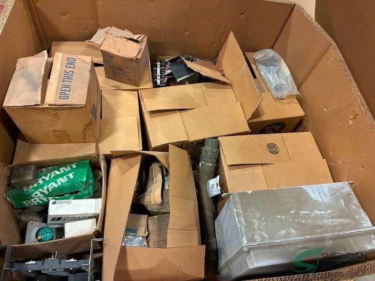 Crate with numerous electrical and control parts image