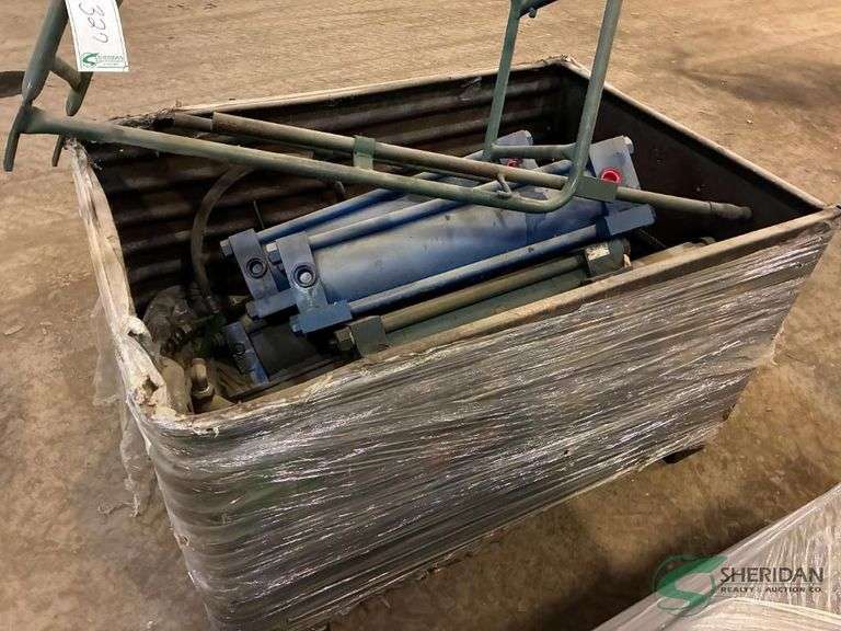 Bin of cylinders and more image