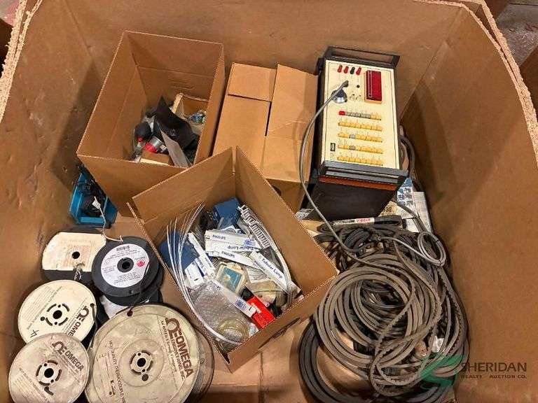 Crate of wire, belts, and more image