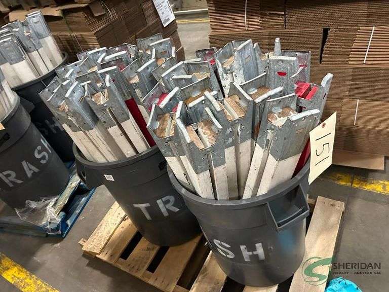 (2) Trash bins of saw horse legs image