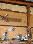 Tools Hanging Above Bench (top 2 shelves)