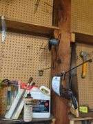 Tools Hanging Above Bench (top 2 shelves)