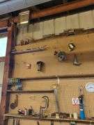 Tools Hanging Above Bench (top 2 shelves)