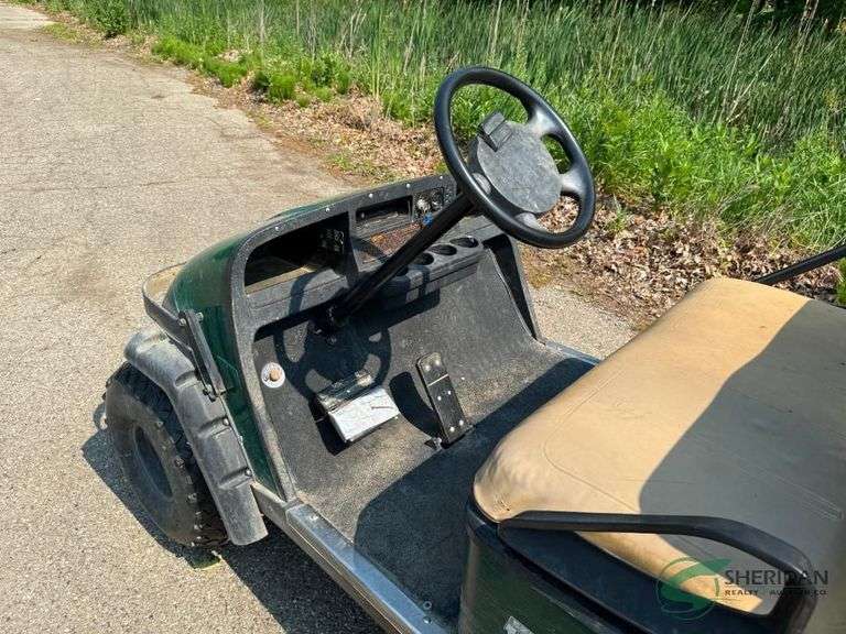 EZ-GO gas golf cart with dump box