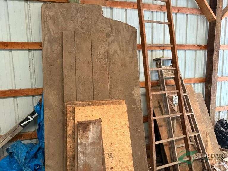 2 wooden ladders and assorted wood