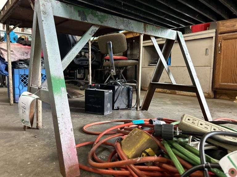 Two iron saw horses