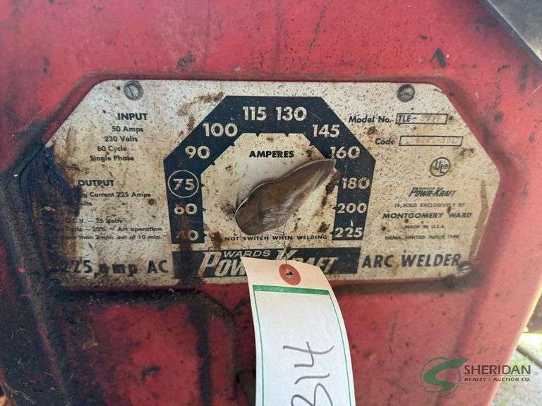 Arc welder with helmet