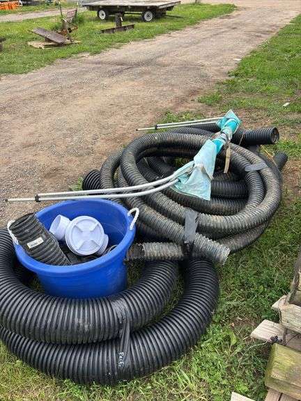 Misc. drain tile plastic fittings, drain, check valve, and 6" 21' perf. plastic corrugated 3" 29' perf. pipe & 4" 53' non-perf. row:4